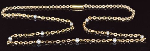 A c1920 9ct gold necklace set with natural pearls and barrel clasp, 7.1g, 43cm