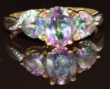 A 9k gold ring set with mystic topaz and diamonds, 2.6g, size P