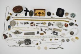 A collection of costume jewellery including Arts & Crafts silver brooch set with a moonstone, silver