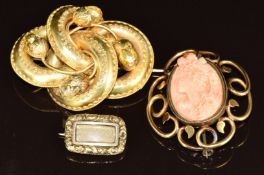 Three Victorian brooches comprising a knot set with foiled citrines (one missing, tests as 15ct