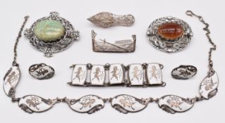 Two silver Robert Allison brooches, one set with amazonite and the other agate (Glasgow 1953), two