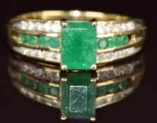 A 9ct gold ring set with emeralds and diamonds, 2.6g, size P