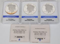Three slabbed 1921, 1922 and 1924 silver dollars from the Proof Archival Collection