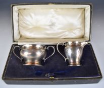 Goldsmiths and Silversmiths Company Ltd cased George V hallmarked silver sugar bowl and milk jug,