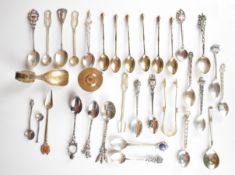 Silver collector's spoons, most marked 800, including German, Austrian and a guilloché enamel