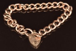 A 9ct rose gold curb link bracelet with heart padlock clasp, 11.4g, 16cm