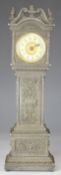 Novelty cast metal miniature longcase clock, the dial marked Ansonia Clock Company, height 30cm