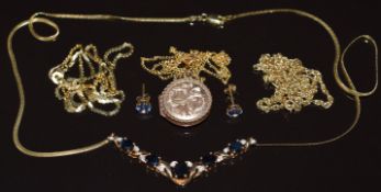 A 14ct gold necklace (2.6g, 40cm), 9ct gold necklace set with oval cut sapphires and diamonds (4.7g,