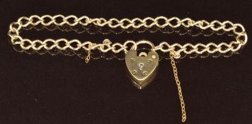A 9ct gold curb link bracelet with heart padlock clasp, maker GJ ltd, 7.8g, 16cm