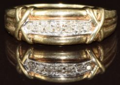 A 9ct gold ring set with diamonds, 3.7g, size R