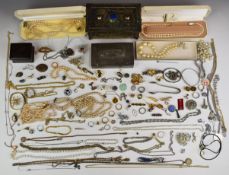 A collection of costume jewellery including Excalibur silver locket, silver pendant in the form of a