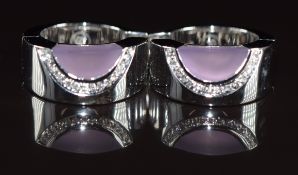 A pair of 18k white gold Movado earrings set with diamonds and glass, in original box, 16.5g