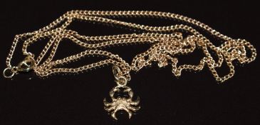 A 9ct gold pendant in the form of a crab on 9ct gold chain, 4.8g, 66cm