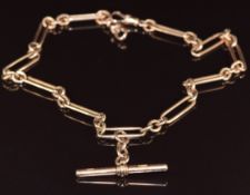 A c1910 9ct rose gold watch chain made up of oval and elongated links, 30.3g, 37cm