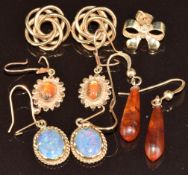 Three pairs of 9ct gold earrings, one pair set with an opal triplet and one moss agate, a pair of