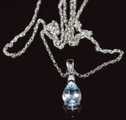 A 9ct white gold pendant set with a pear cut aquamarine and a diamond, on 9k white gold chain, 2.1g,