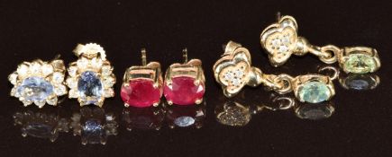 Three pairs of 9ct gold earrings set with rubies, tanzanite and diamonds and Alexandrite and