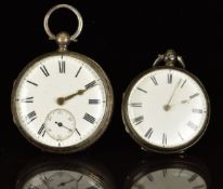 Two hallmarked silver open faced pocket watches, each with gold hands, black Roman numerals and