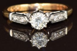 An 18ct gold ring set with a diamond of approximately 0.3ct in a platinum setting, 2.5g, size K