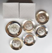 Six white metal dishes, each marked 830 and with embossed decoration, diameter of largest 12cm,