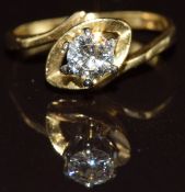 An 18ct gold ring set with a round cut brilliant cut diamond of approximately 0.4ct, 2.8g, size M