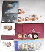 Royal Mint four £20 fine silver coins 'A Timeless First' presentation packs, five £5 coin