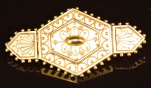 Victorian Etruscan Revival 15ct gold brooch, verso a glass locket compartment, 9g, 4.8cm
