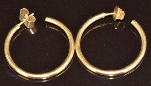 A pair of yellow metal gold hoop earrings (test as 18k), 7.3g