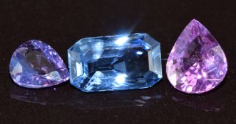A loose 1.3ct pear cut pink/ purple sapphire (Madagascar, heated), a 0.5ct pear cut purple