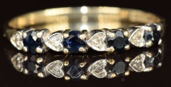 A 9ct gold half eternity ring set with sapphires and diamonds, 1.2g, size P
