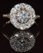 An 18k gold ring set with a cluster of old cut diamonds, the centre diamond approximately 0.5ct, 4.