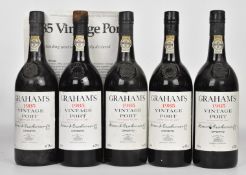 Five bottles of Graham's 1985 Vintage Port, 75cl, 20% vol. PLEASE NOTE ALL ALCOHOL & TOBACCO ITEMS