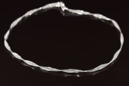 An 18k white gold necklace in a twist pattern, 15.7g
