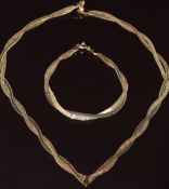 A 9ct gold plaited bracelet and matching necklace, 8.9g, 40cm & 16cm