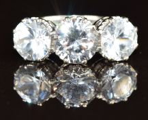 An 18ct white gold ring set with three round cut spinel, 6.7g, size O