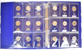 Change Checker album containing UK £2 collectable coins