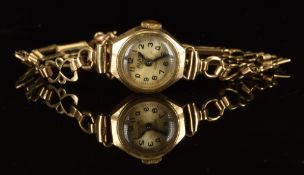 Avia 9ct gold ladies wristwatch with blued hands, Arabic numerals, silver dial and 17 jewel