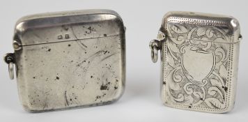 Two George V hallmarked silver vesta cases, one with engraved decoration, Birmingham 1913, maker's