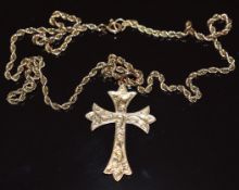Edwardian 9ct rose gold cross with chased decoration on 9ct rose gold rope twist chain, 5.8g