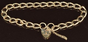 A 9ct gold curb link bracelet with heart padlock clasp, 7.5g, 18cm