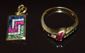 A 14k gold ring set with rubies, emeralds and diamonds (size J) and a 14k gold pendant set with