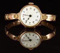 Unnamed 9ct gold ladies wristwatch with blued hands, black Arabic numerals, white dial and