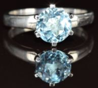 A 9k white gold ring set with a round cut topaz, 4g, size Q