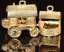 Two 9ct gold charms, a caravan opening to reveal a person at a table and a well, 4.4g