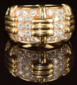 An 18K gold ring set with 36 round cut diamonds graduating from 0.05ct to 0.02ct, total diamond