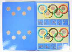 Numismatic Portal coin album containing London 2012 Sports 50p coin collection