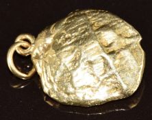 A 9ct gold nugget made into a pendant, 16.2g