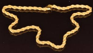 A 22ct gold rope twist necklace with beaded decoration, 40.7g, 55cm