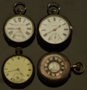 Four hallmarked silver pocket watches comprising a keyless winding half hunter, J G Graves of