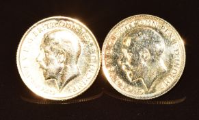 A pair of 9ct gold earrings set with a 1912 half sovereign and a 1915 half sovereign, 8.15g